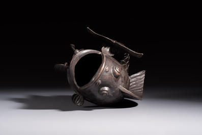 A Chinese or Japanese bronze carp-form vase, 19/20th C.