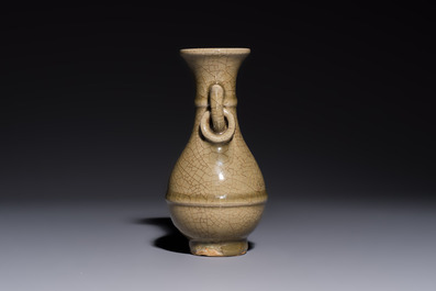 A Chinese Longquan celadon vase with handles, Ming
