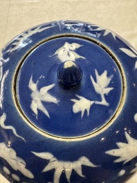 A pair of Chinese blue and white covered vases and two covered jars, Kangxi mark, 19th C
