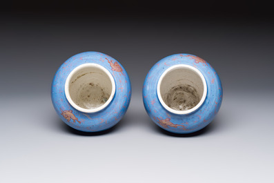A rare pair of Japanese gilt-decorated blue-ground vases, Edo, late 17th C.