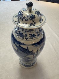 A pair of Chinese blue and white covered vases and two covered jars, Kangxi mark, 19th C