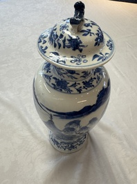 A pair of Chinese blue and white covered vases and two covered jars, Kangxi mark, 19th C