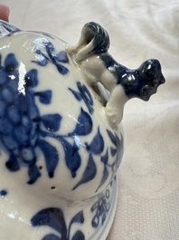 A pair of Chinese blue and white covered vases and two covered jars, Kangxi mark, 19th C