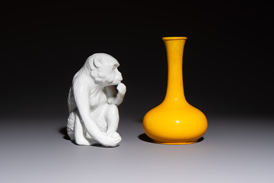 A Japanese Awaji yellow-glazed vase and a white-glazed 'Monkey' group, 19/20th C.