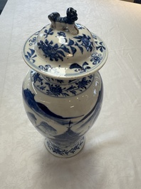 A pair of Chinese blue and white covered vases and two covered jars, Kangxi mark, 19th C