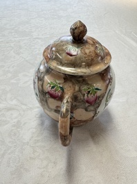 A Chinese famille rose 'Faux-Bois' teapot and three plates, Qianlong