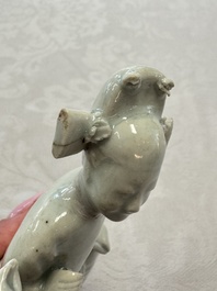 Two Chinese Dehua blanc-de-Chine Buddhist lions, three famille rose figures, and a white-glazed group, Kangxi and later