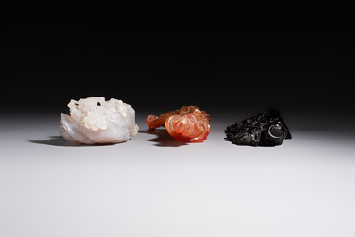 A group of ten Chinese hardstone and cherry amber carvings, 20th C.