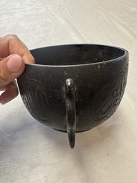 A Chinese bronze censer with Arabic inscription and double fish-form handles, Xuande mark, 17/18th C.