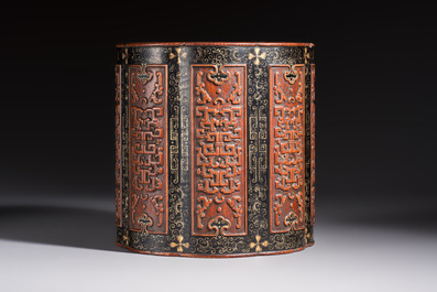 A Chinese gilt black-lacquered huanghuali brush pot with chilong design, Kangxi/Yongzheng
