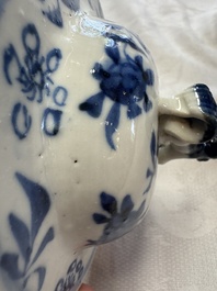 A pair of Chinese blue and white covered vases and two covered jars, Kangxi mark, 19th C