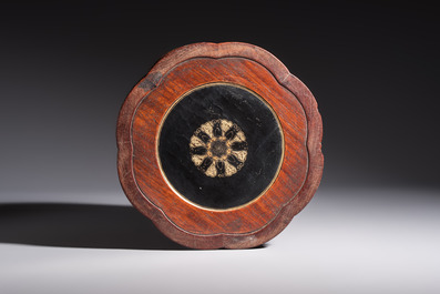 A Chinese gilt black-lacquered huanghuali brush pot with chilong design, Kangxi/Yongzheng