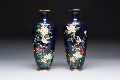 A pair of Japanese silver-wired cloisonn&eacute; enamel vases with birds among flowering branches, Meiji period, 19th C.