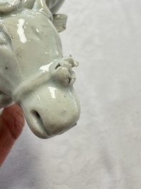 Two Chinese Dehua blanc-de-Chine Buddhist lions, three famille rose figures, and a white-glazed group, Kangxi and later