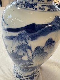 A pair of Chinese blue and white covered vases and two covered jars, Kangxi mark, 19th C