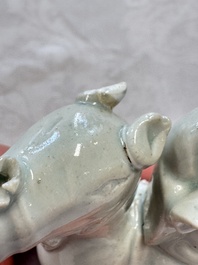 Two Chinese Dehua blanc-de-Chine Buddhist lions, three famille rose figures, and a white-glazed group, Kangxi and later