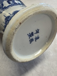 A pair of Chinese blue and white covered vases and two covered jars, Kangxi mark, 19th C
