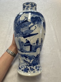 A pair of Chinese blue and white covered vases and two covered jars, Kangxi mark, 19th C