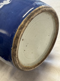 A pair of Chinese blue and white covered vases and two covered jars, Kangxi mark, 19th C