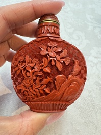 Nine Chinese cinnabar lacquer snuff bottles and a covered box, Qianlong marks, 19/20th C.