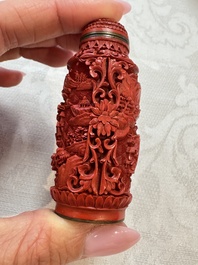 Nine Chinese cinnabar lacquer snuff bottles and a covered box, Qianlong marks, 19/20th C.