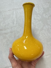 A Japanese Awaji yellow-glazed vase and a white-glazed 'Monkey' group, 19/20th C.