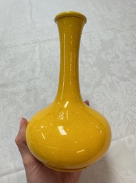 A Japanese Awaji yellow-glazed vase and a white-glazed 'Monkey' group, 19/20th C.