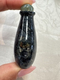 Five Chinese hardstone and glass snuff bottles, 20th C.