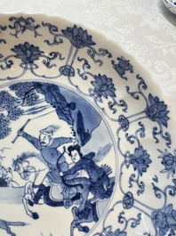 A pair of Chinese blue and white 'Hunting' plates, Chenghua marks, Kangxi