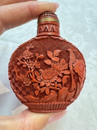 Nine Chinese cinnabar lacquer snuff bottles and a covered box, Qianlong marks, 19/20th C.