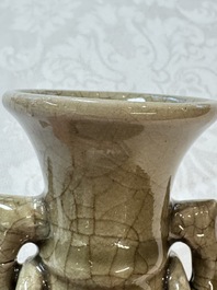 A Chinese Longquan celadon vase with handles, Ming