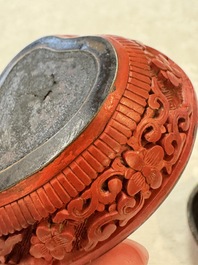 Nine Chinese cinnabar lacquer snuff bottles and a covered box, Qianlong marks, 19/20th C.