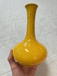 A Japanese Awaji yellow-glazed vase and a white-glazed 'Monkey' group, 19/20th C.