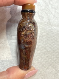 Five Chinese hardstone and glass snuff bottles, 20th C.
