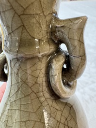 A Chinese Longquan celadon vase with handles, Ming