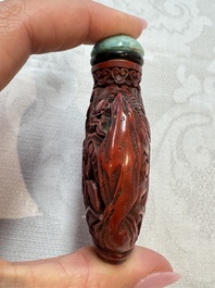 Nine Chinese cinnabar lacquer snuff bottles and a covered box, Qianlong marks, 19/20th C.