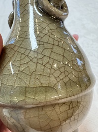 A Chinese Longquan celadon vase with handles, Ming
