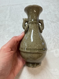 A Chinese Longquan celadon vase with handles, Ming