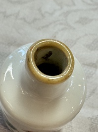 A group of four Chinese porcelain and agate snuff bottles, a miniature vase and a carved seed, Yongzheng and Qianlong marks, 19/20th C.