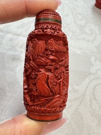 Nine Chinese cinnabar lacquer snuff bottles and a covered box, Qianlong marks, 19/20th C.