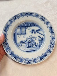 A pair of rare blue and white Dutch Delft 'Shoemaker' plates, 18th C.