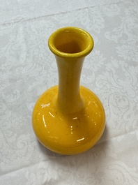 A Japanese Awaji yellow-glazed vase and a white-glazed 'Monkey' group, 19/20th C.