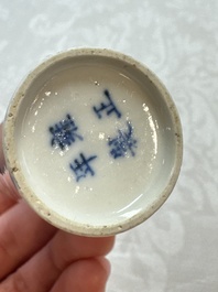 Three Chinese blue and white snuff bottles with landscapes and 'Buddhist Lions', Yongzheng marks, 19th C.