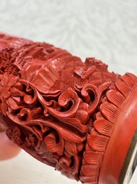 Nine Chinese cinnabar lacquer snuff bottles and a covered box, Qianlong marks, 19/20th C.