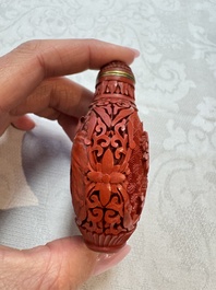 Nine Chinese cinnabar lacquer snuff bottles and a covered box, Qianlong marks, 19/20th C.