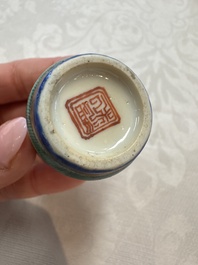 Five Chinese copper-red, blue and white, and polychrome snuff bottles, Yongzheng and Daoguang marks, 19/20th C.
