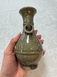 A Chinese Longquan celadon vase with handles, Ming