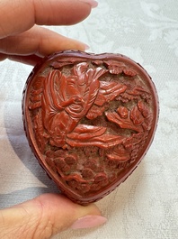Nine Chinese cinnabar lacquer snuff bottles and a covered box, Qianlong marks, 19/20th C.