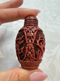 Nine Chinese cinnabar lacquer snuff bottles and a covered box, Qianlong marks, 19/20th C.