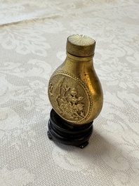 A Chinese gilt-bronze and mother-of-pearl-inlaid snuff bottle with birds among flowering branches, Guangxu mark and of the period
